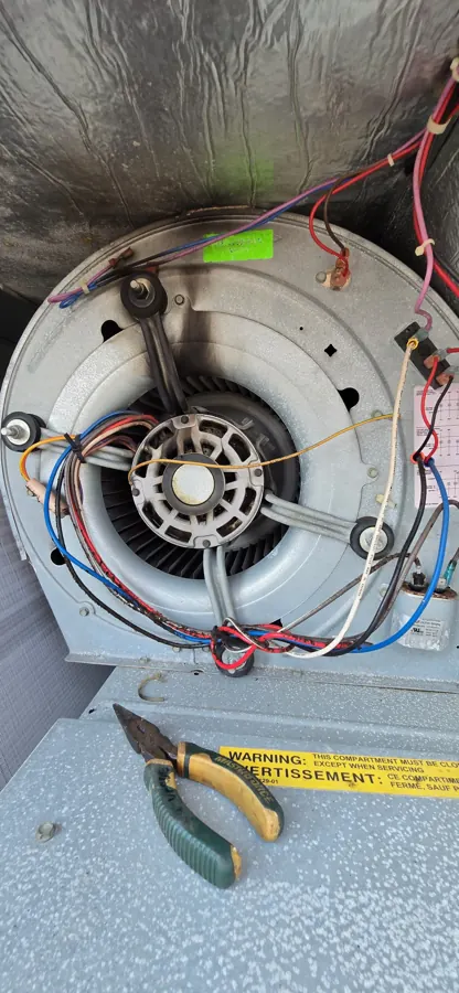 Commercial blower assembly opened for repair — diagnosed on-site